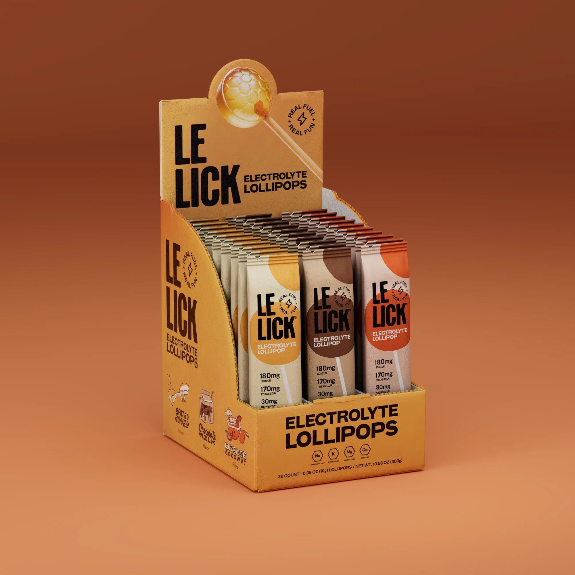 Creamy box of lollipops on an orange backdrop